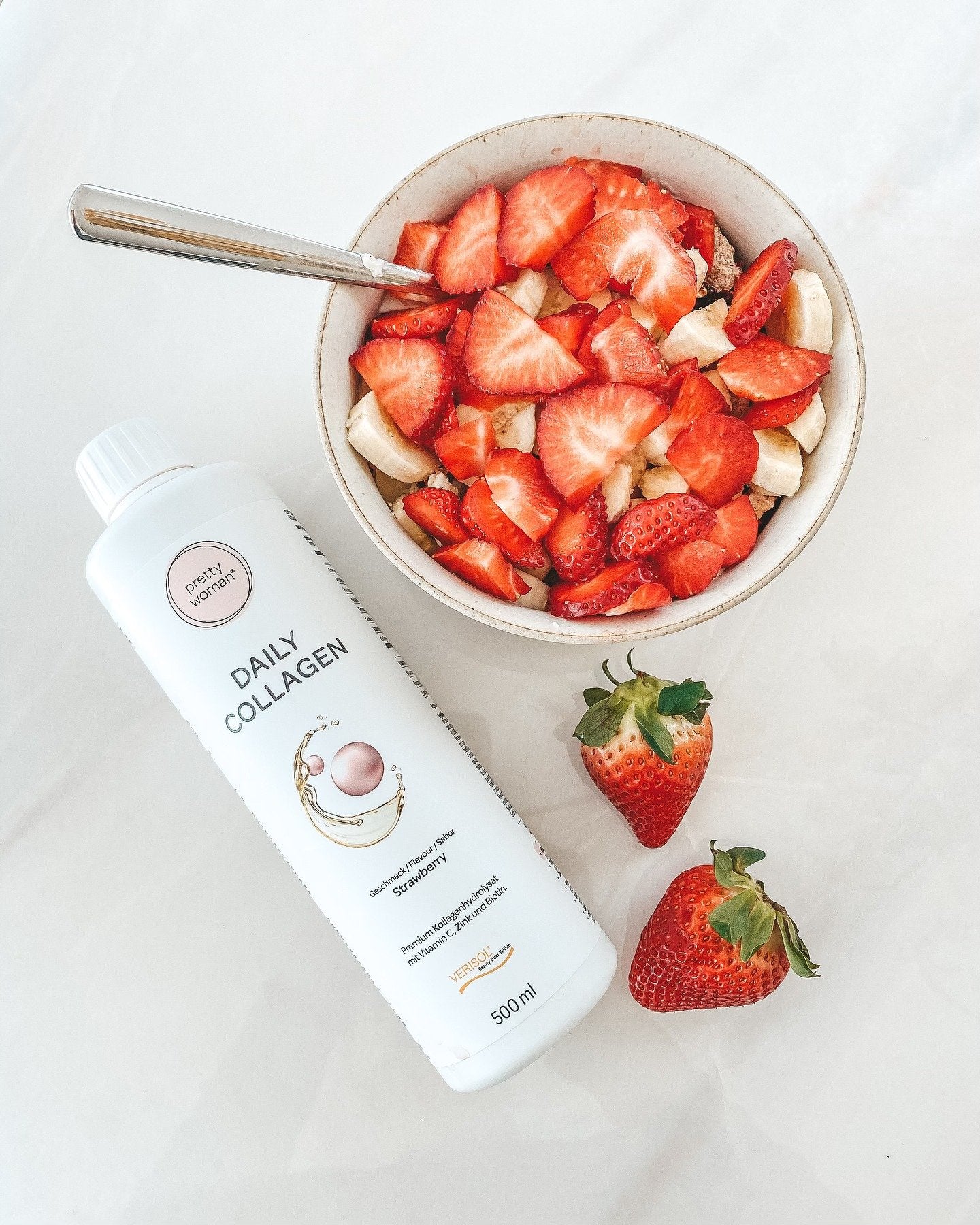 Presentation of Pretty woman® Daily Collagen 500 ml- Collagen Beauty Drink with Strawberry Flavor